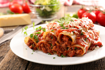Sticker - cannelloni with minced beef and tomato sauce and cheese