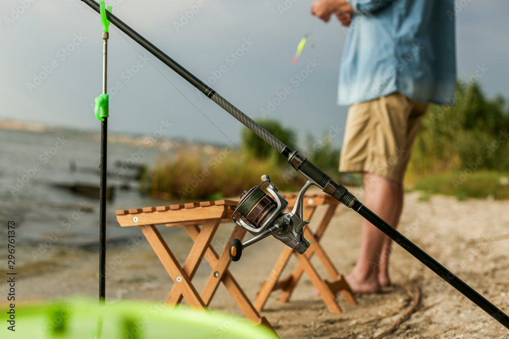 Fishing in river on summer day