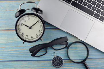 Flat lay business workplace and objects on wooden background. Selective focus.