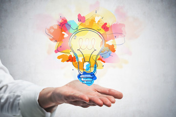 Poster - businessman hand showing bright idea