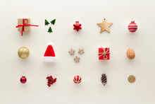 Christmas Composition. Santa Hat Star Gift Bauble Pine Cone Elements Set Top View Background With Copy Space For Your Text. Flat Lay.