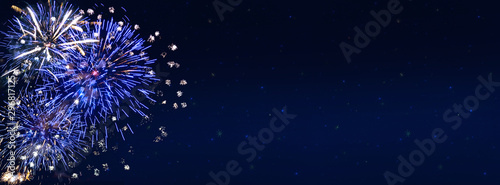 Cuadros en Lienzo Fireworks, colorful sylvester-fireworks on black background with sparks