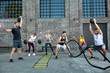 Group of healthy people working out, outside workout