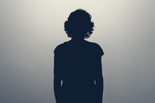 Unknown Female Person Silhouette In Studio. Concept Of Depression, Stress Or Anonymous