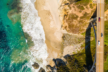 Wall Mural - Arial view of the California Bixby bridge in Big Sur in the Monterey County along side State Route 1 US, the ocean road. 