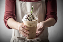 Barista Serving Coffee Frappuccino In Plastic Cup