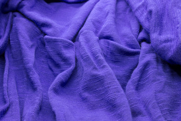 This is a photograph of Blue textured fabric background