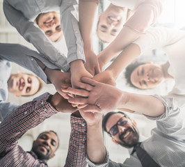 Wall Mural - stack of hands. unity and teamwork concept.