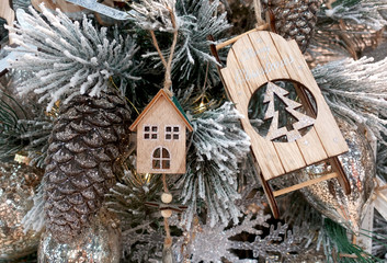 Christmas tree decorated with wooden toys in retro style  