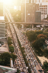 Wall Mural - Bangkok City skyline with urban skyscrapers at sunset