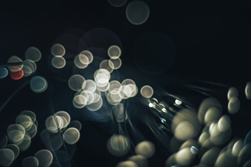 Poster - beautiful abstract optical fiber white light bokeh in the darkness background.