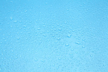 Close Up Water Drops On Blue Background, Water Drop In Macro Photography