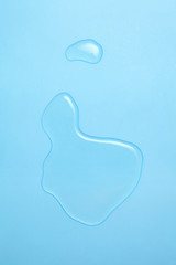 Wall Mural - water drops on blue background with a blank space for a text