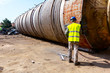 © Roman_23203 - Worker is cutting old metal industrial equipment with acetylene torch