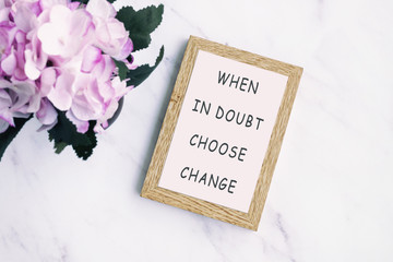 Wall Mural - When in doubt choose change - Inspiration quotes on wooden frame.