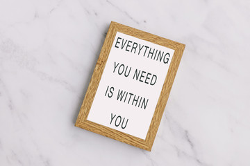 Wall Mural - Everything you need is within you - Inspiration quotes on wooden frame.