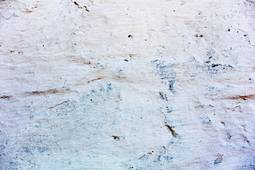 Texture of a concrete wall with cracks and scratches which can be used as a background