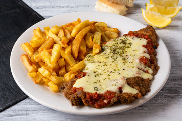 Wall Mural - milanesa napolitana con fritas