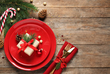 Beautiful Christmas Table Setting On Wooden Background, Top View. Space For Text