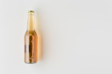 Sticker - Top view of a beer bottle mockup.