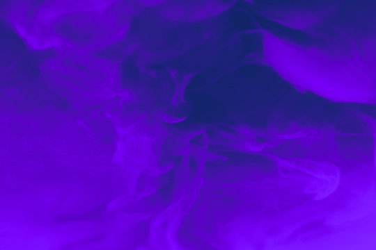 Beautiful abstract texture colorful smoke on pink purple blue background and white smoke graphic on the colorful background pattern