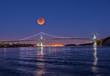 © mauro53 - A fool blood moon eclipse rising over the Lions Gate bridge in Vancouver Canada