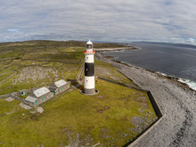 Lighthouse, Rocky Beach And Farms  In Inisheer Island