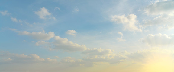 blue sky with clouds and sunlight