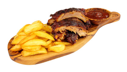 Wall Mural - Grilled mini pork ribs and French fries on a wooden serving board isolated on a white background