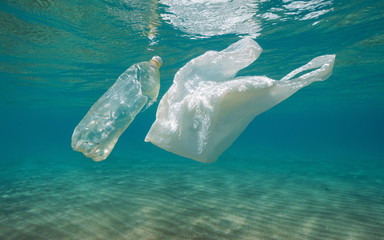 Wall Mural - Underwater pollution, plastic bag and bottle in the sea, Mediterranean, France