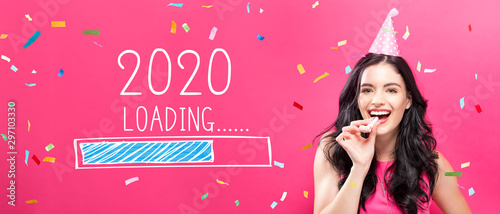 Fotografía Loading new year 2020 with young woman with party theme on a pink background