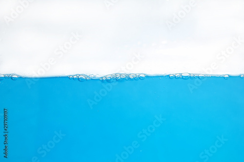 Water Surface Splash and bubbles . on white background. © PuripattCome