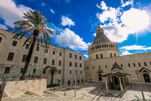 The Chirst Church Under The Cloudy Blue Sky With The Palms, Nazareth, Israel