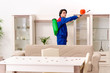© Elnur - Young contractor doing pest control at home