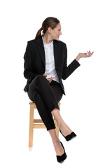 Poster - businesswoman sitting and presenting to a side