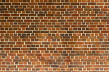 Reddish Brown Color Vintage Brick Wall Texture With A Quilted Look, Showing Faint Shadows Of A Tree And Street Lamp