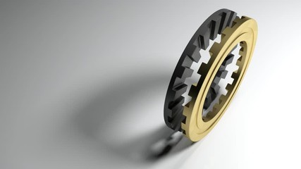 Poster - Two mating gears with frontal toothings, one in black iron and the other in satin brass, standing on a white floor - 3D rendering video clip