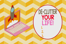 Conceptual Hand Writing Showing De Clutter Your Life. Concept Meaning Remove Unnecessary Items From Untidy Or Overcrowded Places Rocket Launching Clouds Laptop Startup Project Growing SEO
