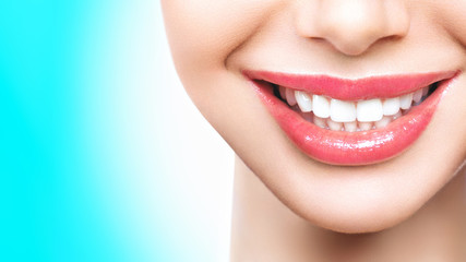 Wall Mural - Perfect healthy teeth smile of a young woman. Teeth whitening. Dental clinic patient. Image symbolizes oral care dentistry, stomatology