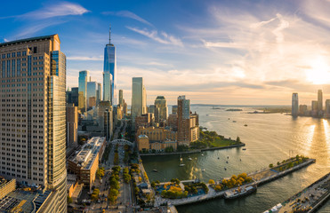 Fototapete - Aerial view of Lower Manhattan skyline at sunset viewed from above West Street in Tribeca neighborhood.