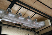 Air Ducts For Ventilation Ducts Made Of Large Spherical Aluminum Material, Mounted On The Factory Ceiling And Hall