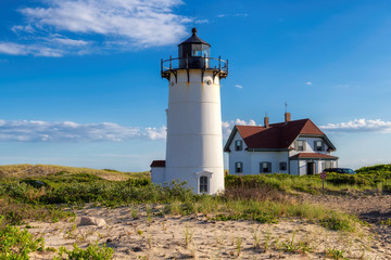 Canvas Print - Race Point Light Lighthouse in beach dunes on the beach at Cape Cod, New England, Massachusetts, USA