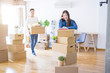 © Krakenimages.com - Beautiful young asian couple looking happy, young woman smiling excited moving to a new home