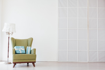 Wall Mural - green vintage chair in the interior of a white empty room