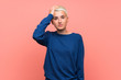© luismolinero - Teenager girl with white short hair over pink wall with an expression of frustration and not understanding