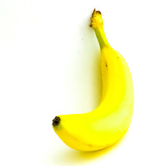 Wall Mural - Studio shot single organic whole banana isolated on white