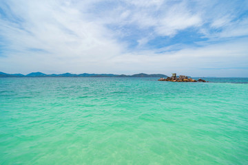 Phi Phi, Maya beach with blue turquoise seawater, Phuket island in summer season during travel holidays vacation trip. Andaman ocean, Thailand. Tourist attraction with blue cloud sky.