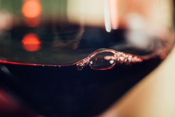 Bubbles in Red Wine - Macro Close-Up Shot