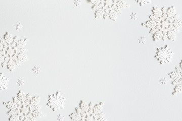 christmas composition. frame made of snowflakes on pastel gray background. christmas, winter, new ye