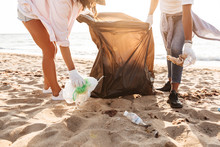 Photo Of Eco Volunteers Cleaning Beach From Plastic Garbage Together